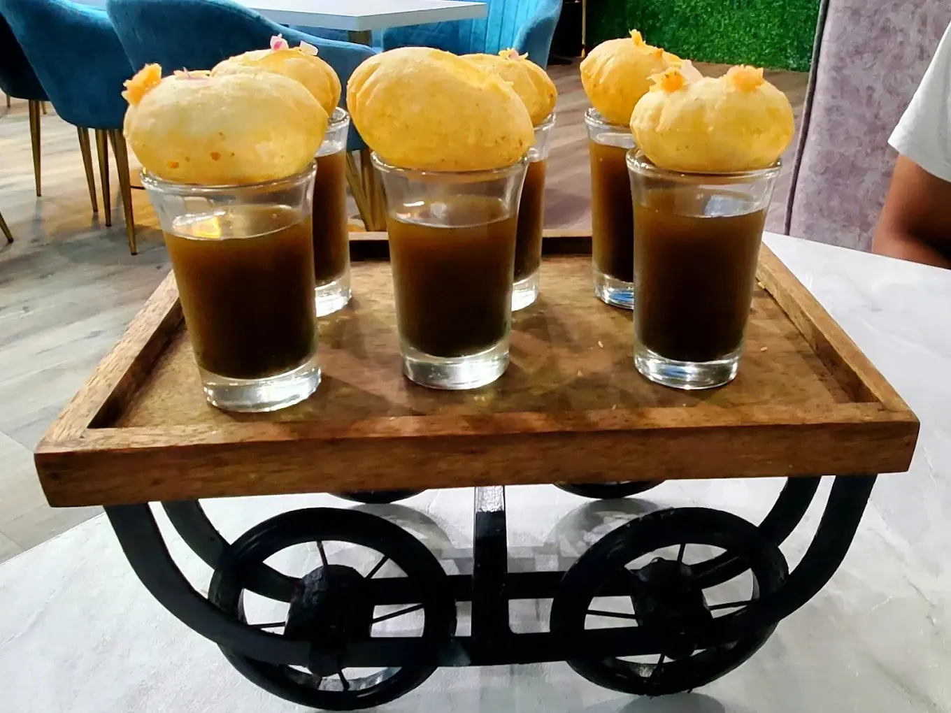 Hot Gulab Jamun - Traditional Indian Sweet at Desi Club Edmonton - Soft fried dough balls soaked in rose and cardamom syrup served warm